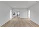 Bright living room with hardwood floors. and neutral walls with a view to the hallway at 3562 Clubland Dr, Marietta, GA 30068
