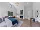 Bright main bedroom with sitting area, fireplace, and hardwood floors at 3562 Clubland Dr, Marietta, GA 30068