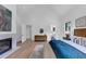The main bedroom offers hardwood floors, a fireplace, and access to the main bath at 3562 Clubland Dr, Marietta, GA 30068