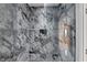 Stunning shower with elegant tile work and recessed shelving for a spa-like experience at 3562 Clubland Dr, Marietta, GA 30068