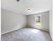 Bedroom with neutral carpet, natural light, and soft wall color at 30 Court S, Ellenwood, GA 30294