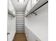 Walk-in closet with custom shelving, drawers, and ample hanging space at 30 Court S, Ellenwood, GA 30294