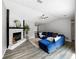 Inviting living room features a stone fireplace, vaulted ceilings, and stylish decor at 30 Court S, Ellenwood, GA 30294