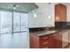 Modern kitchen with sleek appliances, dark backsplash, and countertop bar perfect for entertaining at 3324 Peachtree Ne Rd # 1604, Atlanta, GA 30326