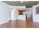Spacious living room with wood floors and an open layout that flows into the kitchen area at 3324 Peachtree Ne Rd # 1604, Atlanta, GA 30326