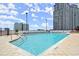 Rooftop pool with lounge chairs providing a luxurious outdoor space with city views at 3324 Peachtree Ne Rd # 1604, Atlanta, GA 30326
