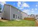 Large backyard with a patio area, ideal for relaxation and outdoor gatherings at 4778 Moonstone Trce, Kennesaw, GA 30144