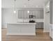 Kitchen featuring a large island, stainless steel appliances, and modern cabinetry at 4778 Moonstone Trce, Kennesaw, GA 30144
