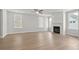 Spacious living room showcasing natural light and a modern fireplace with white shiplap at 4778 Moonstone Trce, Kennesaw, GA 30144