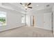 Spacious main bedroom with a ceiling fan, recessed lighting, and large windows at 4778 Moonstone Trce, Kennesaw, GA 30144