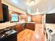 Functional kitchen featuring ample counter space, wood cabinets and modern appliances, ideal for cooking and entertaining at 813 Crockett Ct, Decatur, GA 30033