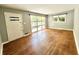 Inviting living room featuring beautiful hardwood floors and ample natural light, creating a warm atmosphere at 813 Crockett Ct, Decatur, GA 30033