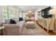Bright living room featuring hardwood floors and a comfortable seating arrangement at 2163 Medfield Ne Trl, Chamblee, GA 30345