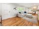 Open-concept living room with hardwood floors and ample natural light at 2163 Medfield Ne Trl, Chamblee, GA 30345