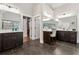 A spacious bathroom features a double vanity with dark cabinets and modern tile flooring, with a closet in view at 540 Byrd Mountain Ln, Canton, GA 30114