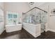 Elegant bathroom with a soaking tub and a luxurious glass-enclosed shower at 540 Byrd Mountain Ln, Canton, GA 30114