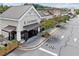 A street view showcases a brewery with outdoor seating in a charming shopping center at 540 Byrd Mountain Ln, Canton, GA 30114