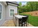 Outdoor kitchen area with built-in grill and bar seating at 540 Byrd Mountain Ln, Canton, GA 30114