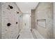 Spacious shower with gray tiling and multiple shower heads at 6175 River Shore Pkwy, Atlanta, GA 30328
