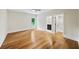Bedroom with hardwood floors, en suite bathroom, and natural light at 6175 River Shore Pkwy, Atlanta, GA 30328
