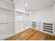 Walk-in closet with custom shelves and drawers, offering ample storage space at 6175 River Shore Pkwy, Atlanta, GA 30328