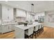 Bright kitchen with a large island, stainless appliances, and herringbone backsplash at 6175 River Shore Pkwy, Atlanta, GA 30328