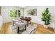 Bright home office with hardwood floors, a neutral rug, and a large window at 6175 River Shore Pkwy, Atlanta, GA 30328