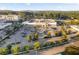 Aerial view of a Publix grocery store with parking, surrounding trees, and other retail at 1271 Mackintosh Nw Park # 30, Atlanta, GA 30318