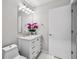 Bathroom featuring marble finishes, modern sink, and overhead light at 1271 Mackintosh Nw Park # 30, Atlanta, GA 30318