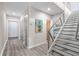 Inviting entryway with modern staircase, neutral walls, and stylish flooring at 1271 Mackintosh Nw Park # 30, Atlanta, GA 30318