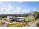 View of Topgolf golf complex showcasing its modern architecture, driving range, and well-maintained landscape at 1271 Mackintosh Nw Park # 30, Atlanta, GA 30318
