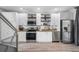Modern kitchen with stainless steel appliances, white cabinets, and granite countertops at 1271 Mackintosh Nw Park # 30, Atlanta, GA 30318