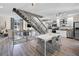 Open-concept living space with modern staircase, sleek flooring, and a bright, airy atmosphere at 1271 Mackintosh Nw Park # 30, Atlanta, GA 30318
