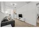 Comfortable living room with carpet, TV, and a convenient doorway at 1271 Mackintosh Nw Park # 30, Atlanta, GA 30318