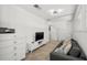 Living room with comfortable sofa and clean white dresser and cabinets at 1271 Mackintosh Nw Park # 30, Atlanta, GA 30318