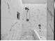 Modern shower with marble tile, rainfall showerhead, and a built-in niche for storage at 1271 Mackintosh Nw Park # 30, Atlanta, GA 30318