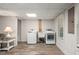Basement laundry area with modern washer and dryer hookups and ample lighting at 2401 Stockton Dr, Marietta, GA 30066