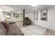 Spacious basement with wood-look flooring, neutral walls, and ample lighting at 2401 Stockton Dr, Marietta, GA 30066