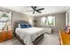 Cozy bedroom with large window, ceiling fan, and neutral decor at 2401 Stockton Dr, Marietta, GA 30066