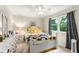 Comfortable bedroom with ceiling fan, window and dresser with mirror at 2401 Stockton Dr, Marietta, GA 30066
