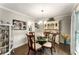 Elegant dining room featuring a glass-top table, stylish chairs, and ample natural light at 2401 Stockton Dr, Marietta, GA 30066