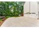 Long driveway with a two-car garage and access to a spacious backyard at 2401 Stockton Dr, Marietta, GA 30066