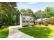 Charming two-story home with a spacious yard and a inviting front porch, perfect for relaxing at 2401 Stockton Dr, Marietta, GA 30066