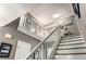 Elegant staircase with white railings and wood steps leading to upper level at 2401 Stockton Dr, Marietta, GA 30066