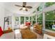 Inviting sunroom with lots of natural light and access to the outdoors at 2401 Stockton Dr, Marietta, GA 30066