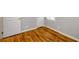Bright bedroom featuring hardwood floors, two windows, and neutral-colored walls at 2895 Akron St, Atlanta, GA 30344