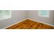 Cozy bedroom with warm-toned hardwood floors and bright natural light at 2895 Akron St, Atlanta, GA 30344