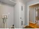 Neutral hallway with gray walls, white trim, and a door leading to another room at 2895 Akron St, Atlanta, GA 30344