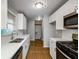 Well-lit kitchen showcasing modern cabinets, countertops, and stainless steel appliances at 2895 Akron St, Atlanta, GA 30344