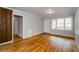Sunlit living room with polished hardwood floors and fresh neutral paint at 2895 Akron St, Atlanta, GA 30344